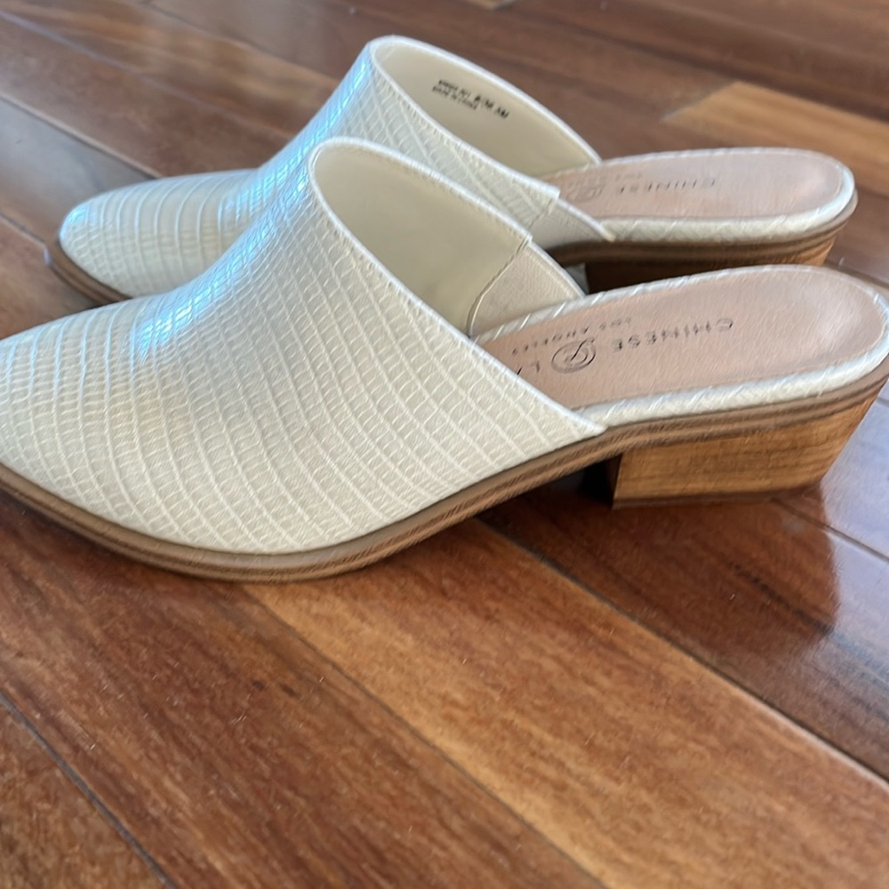 Chinese Laundry white mules.